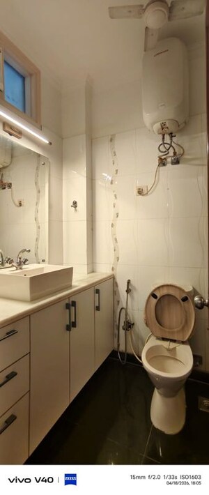 Bathroom in 3 BHK Apartment at Defence Colony – for Rent