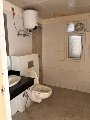 Bathroom in 2 BHK Apartment at Godrej Meridien, Sector 106 – for Rent