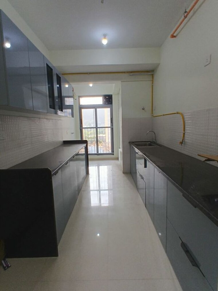 Kitchen, courtyard-by-narang-realty-and-the-wadhwa-group 3 Bedroom 1160 Sq.Ft. Apartment In Pokhran Road No Two Thane 10414186
