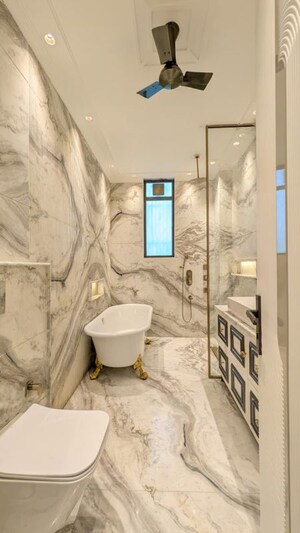 Bathroom in 4 BHK Builder Floor at Defence Colony – for Rent