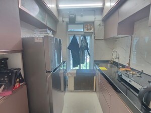 Kitchen in 1 BHK Apartment at Romell Serene, Borivali West – for Sale