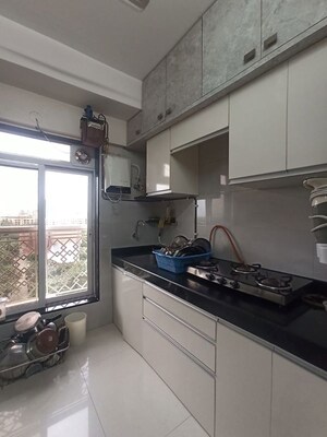 Kitchen in 2 BHK Apartment at Romell Empress, Borivali West – for Sale