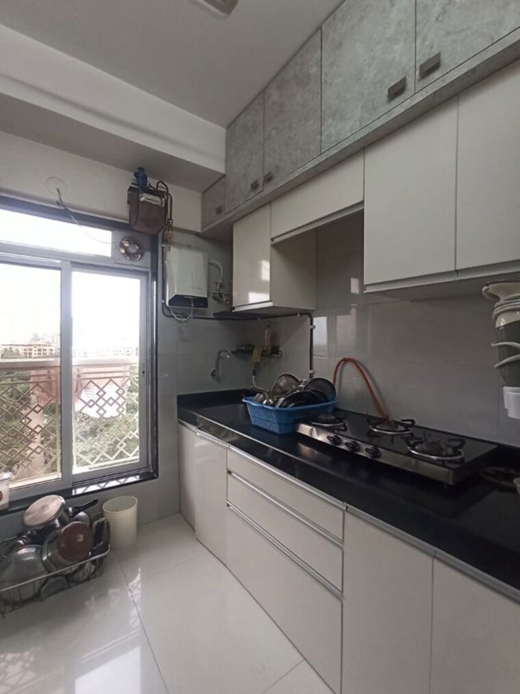 Kitchen, romell-empress 2 Bedroom 610 Sq.Ft. Apartment In Borivali West Mumbai 10414292