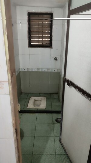 Bathroom in 2 BHK Apartment at Bamibai Krupa, Dombivli West – for Rent