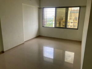Room in 2 BHK Apartment at Nisha Residency, Goregaon West – for Sale