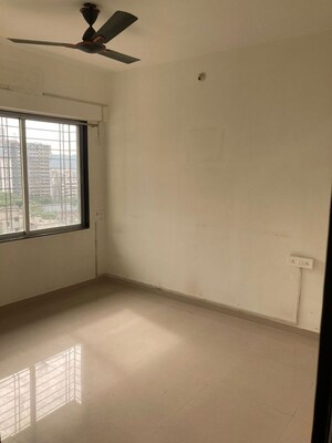 Room in 2 BHK Apartment at Nisha Residency, Goregaon West – for Sale
