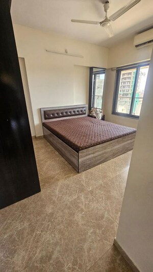 Bedroom in 2 BHK Apartment at Nisha Residency, Goregaon West – for Sale