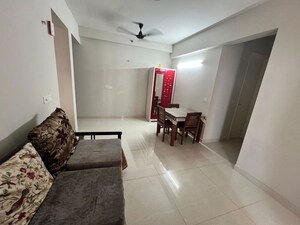 Living Room in 2 BHK Apartment at Eldeco Live By The Greens, Sector 150 – for Rent