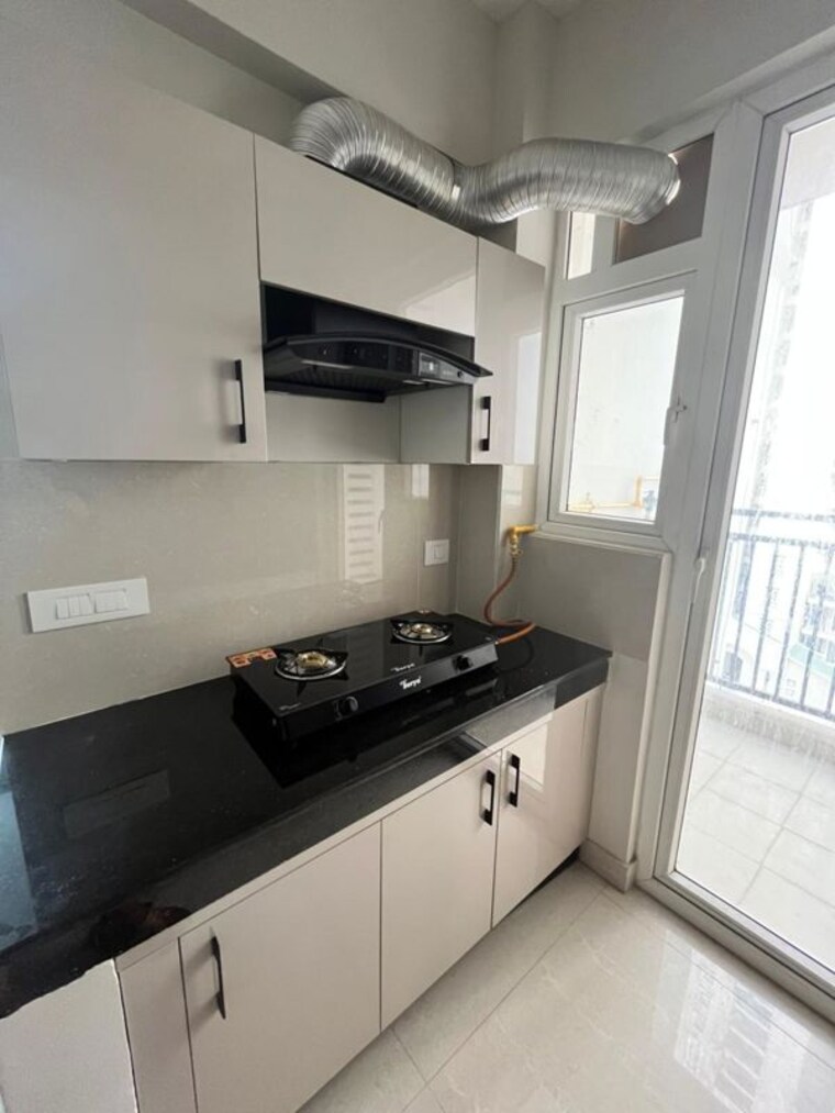 Kitchen, eldeco-live-by-the-greens 2 Bedroom 1137 Sq.Ft. Apartment In Sector 150 Noida 10414585