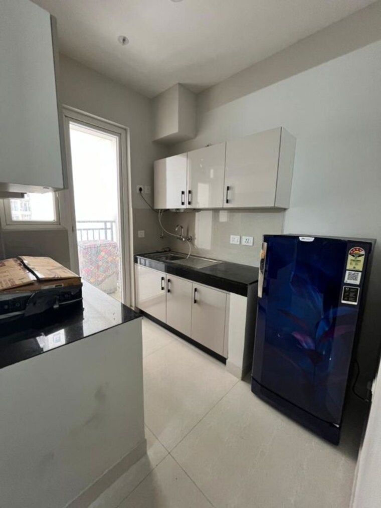 Kitchen, eldeco-live-by-the-greens 2 Bedroom 1137 Sq.Ft. Apartment In Sector 150 Noida 10414585
