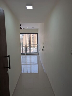 Building Lobby in 2 BHK Apartment at Dynamix Divum, Malad East – for Rent