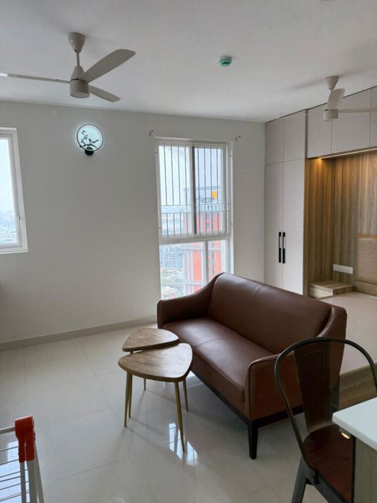 Living Room, brigade-cornerstone-utopia-eden 1 RK 400 Sq.Ft. Apartment In Varthur Bangalore 10414656