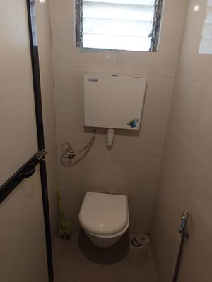 Bathroom in 1 BHK Apartment at Parijat Gardens Marigold CHS, Kasarvadavali – for Rent