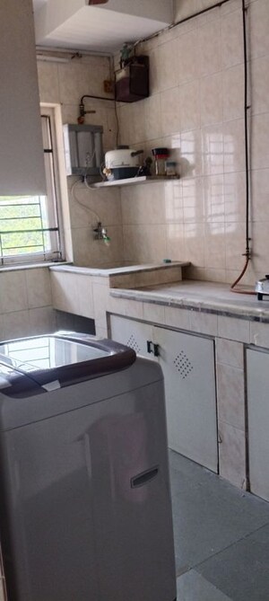 Kitchen in 2 BHK Apartment at Horizon CHS, Andheri West – for Sale