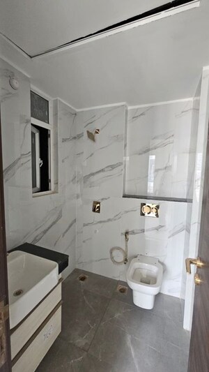 Bathroom in 2 BHK Builder Floor at Smart World Orchard, Sector 61 – for Rent