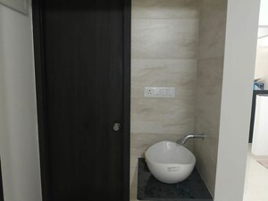 Bathroom in 2 BHK Apartment at Nexus Atrium, Moshi – for Rent