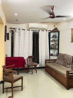 Living Room in 1 RK Apartment at Hanuman Ramanand CHS, Vile Parle East – for Rent