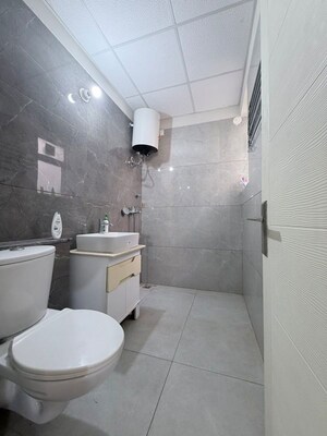 Bathroom in 2 BHK Apartment at Trishla City, Patiala Road – for Rent