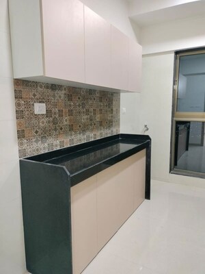 Kitchen in 3 BHK Apartment at Raj Infinia, Malad West – for Rent