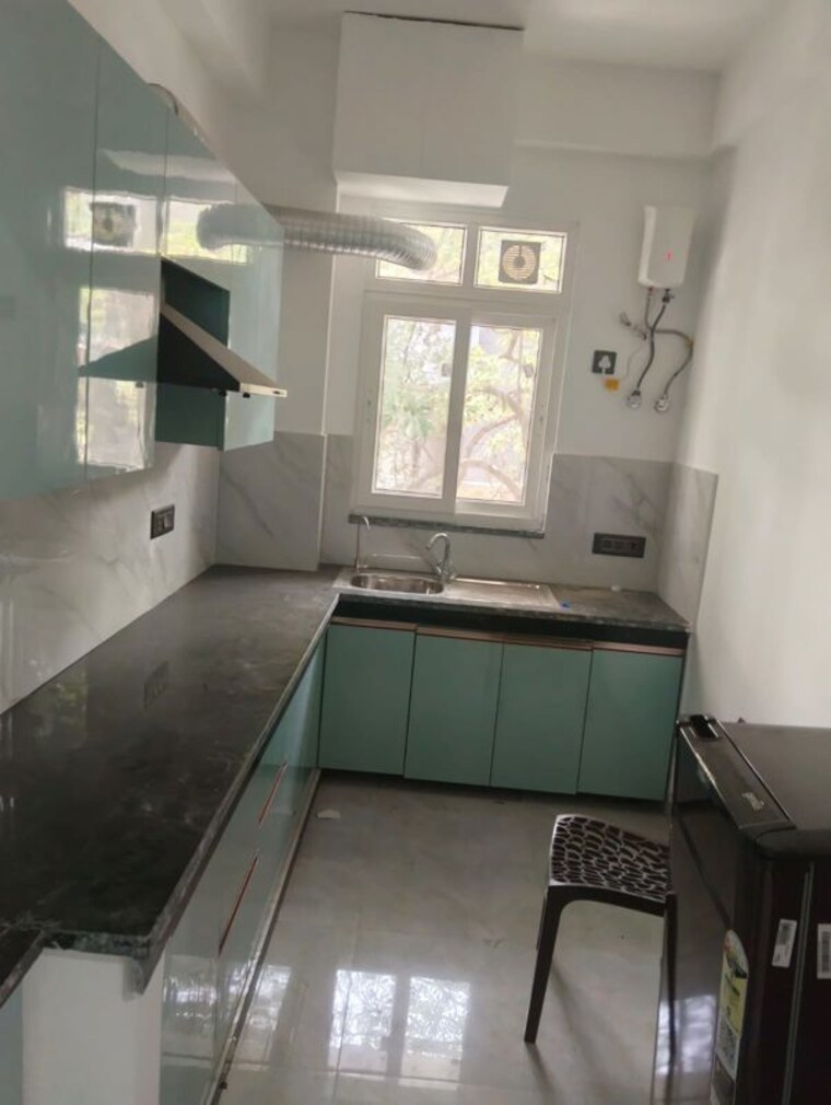Kitchen, suncity 1 Bedroom 280 Sq.Yd. Builder Floor In Suncity Gurgaon 10414934