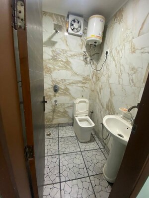 Bathroom in 3 BHK Builder Floor at Panchsheel Vihar – for Rent