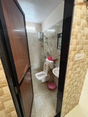 Bathroom in 1 BHK Apartment at Raunak Unnathi Woods Phase 7 A And B, Ghodbunder Road – for Rent