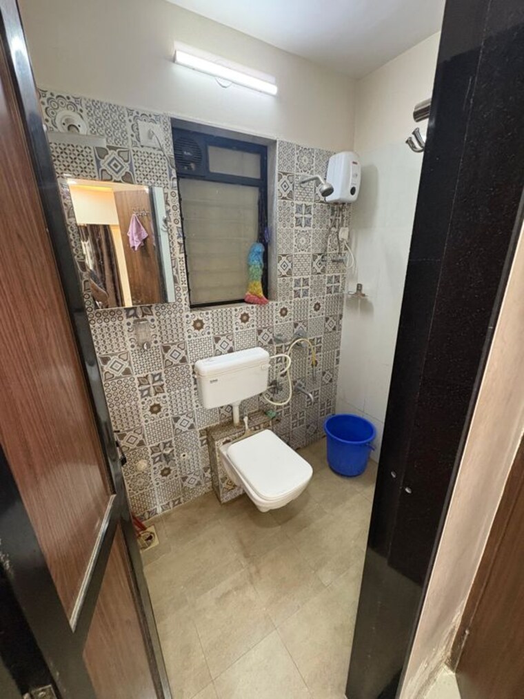 Bathroom, raunak-unnathi-woods-phase-7-a-and-b 1 Bedroom 560 Sq.Ft. Apartment In Ghodbunder Road Thane 10414941