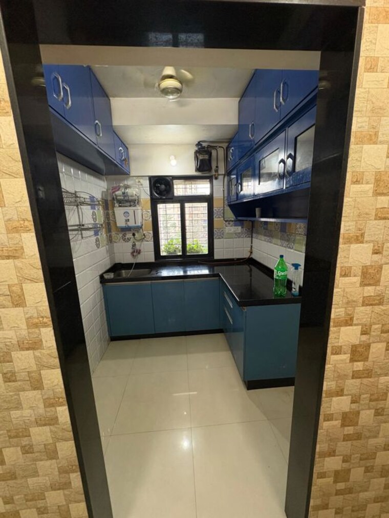 Kitchen, raunak-unnathi-woods-phase-7-a-and-b 1 Bedroom 560 Sq.Ft. Apartment In Ghodbunder Road Thane 10414941