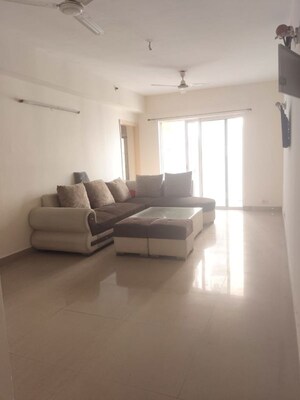 Living Room in 4 BHK Apartment at Logix Blossom County, Sector 137 – for Rent