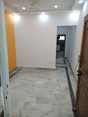 Living Room in 1.5 BHK Builder Floor at Amar Colony – for Rent