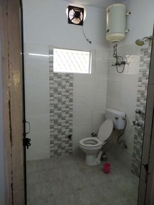Bathroom in 1.5 BHK Builder Floor at Amar Colony – for Rent