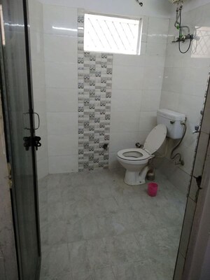 Bathroom in 1.5 BHK Builder Floor at Amar Colony – for Rent
