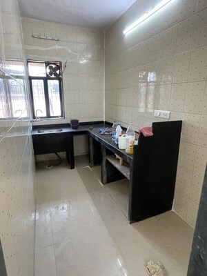 Kitchen in 2 BHK Apartment at  Army Welfare CHS, Nerul – for Sale