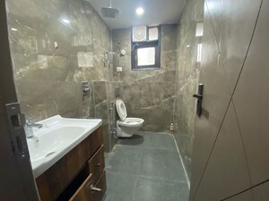 Bathroom in 2 BHK Builder Floor at Chattarpur – for Rent