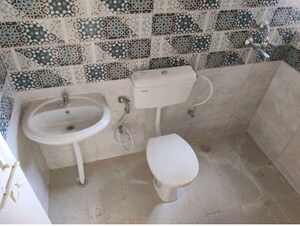 Bathroom in 1 BHK Apartment at Signature Global Golf Greens, Sector 79 – for Rent