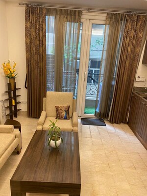 Living Room in Studio Apartment at Panchsheel Park – for Rent