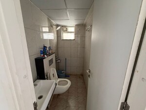Bathroom in 2.5 BHK Apartment at Gokhale Krishnakunj, Mukund Nagar – for Rent