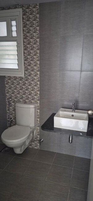 Bathroom in 1 BHK Apartment at Adarsh Greens, Kogilu – for Rent