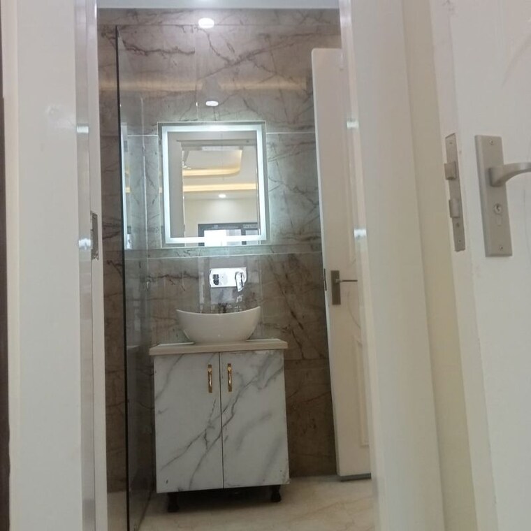 Bathroom, bptp-district-faridabad 3 Bedroom 1350 Sq.Ft. Builder Floor In Sector 81 Faridabad 10415142
