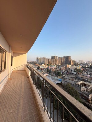 Balcony in 2 BHK Apartment at Ansal Crown Heights, Sector 80 – for Rent