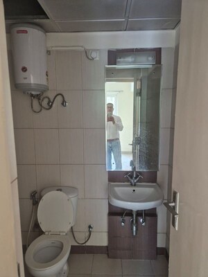Bathroom in 3 BHK Apartment at Mahindra Aura, Sector 110a – for Rent