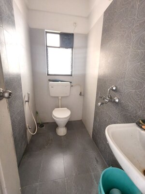 Bathroom in 2 BHK Apartment at Kolte Patil Margosa Heights, Mohammadwadi – for Rent