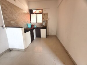 Kitchen in 2 BHK Apartment at Kolte Patil Margosa Heights, Mohammadwadi – for Rent