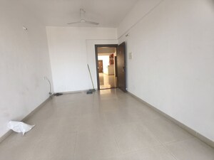 Living Room in 2 BHK Apartment at Kolte Patil Margosa Heights, Mohammadwadi – for Rent