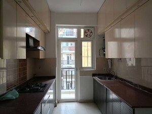 Kitchen in 2 BHK Apartment at Amrapali Zodiac, Sector 120 – for Sale
