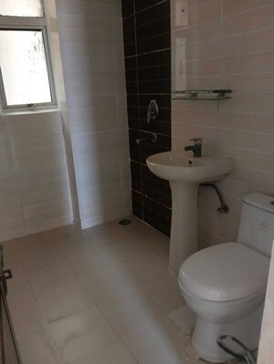 Bathroom in 2.5 BHK Apartment at Amrapali Zodiac, Sector 120 – for Sale