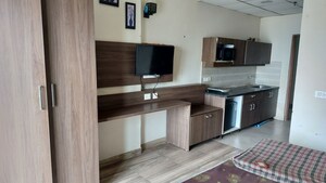 Kitchen in 1 RK Apartment at Paramount Golf Forest Studio Apartments - OAK Towe, Zeta I Greater Noida – for Rent