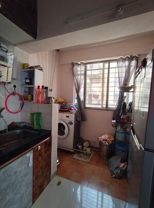 Kitchen in 2 BHK Apartment at Kasar Amboli – for Sale