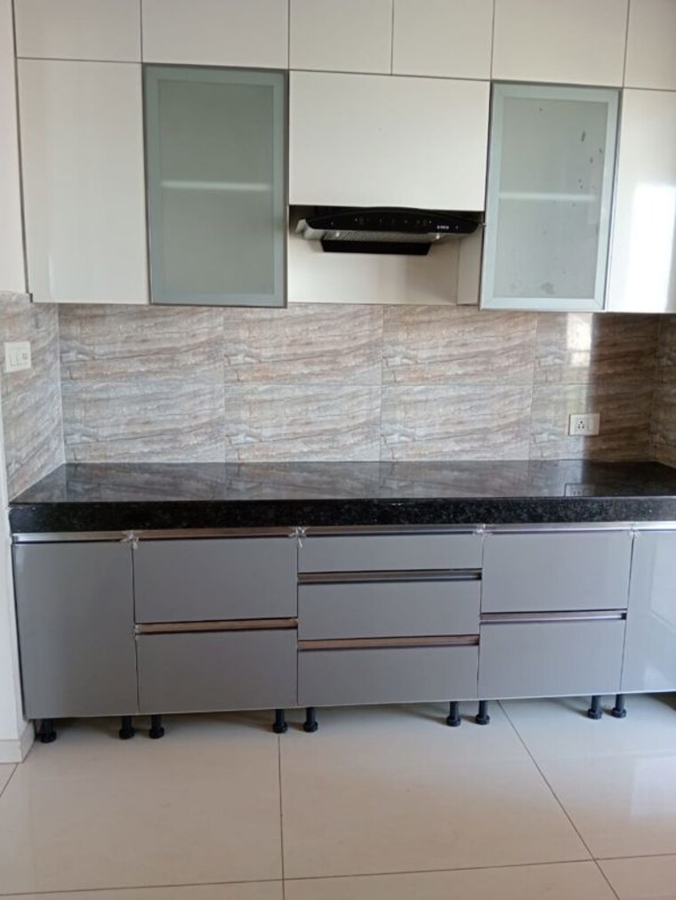 Kitchen, shapoorji-pallonji-joyville-gurgaon 2 Bedroom 1215 Sq.Ft. Apartment In Sector 102 Gurgaon 10415352