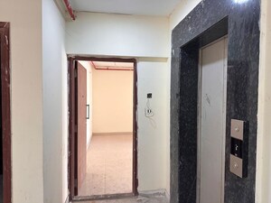 Building Lobby in 2 BHK Apartment at Siddhi Highland Park Phase 2, Kapur Bawdi – for Sale